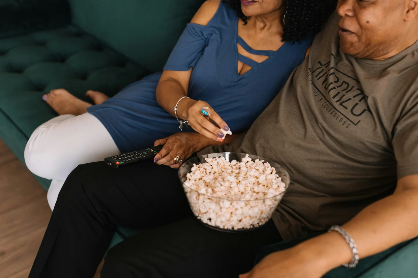 Popcorn and a remote ready for an evening watching television at home